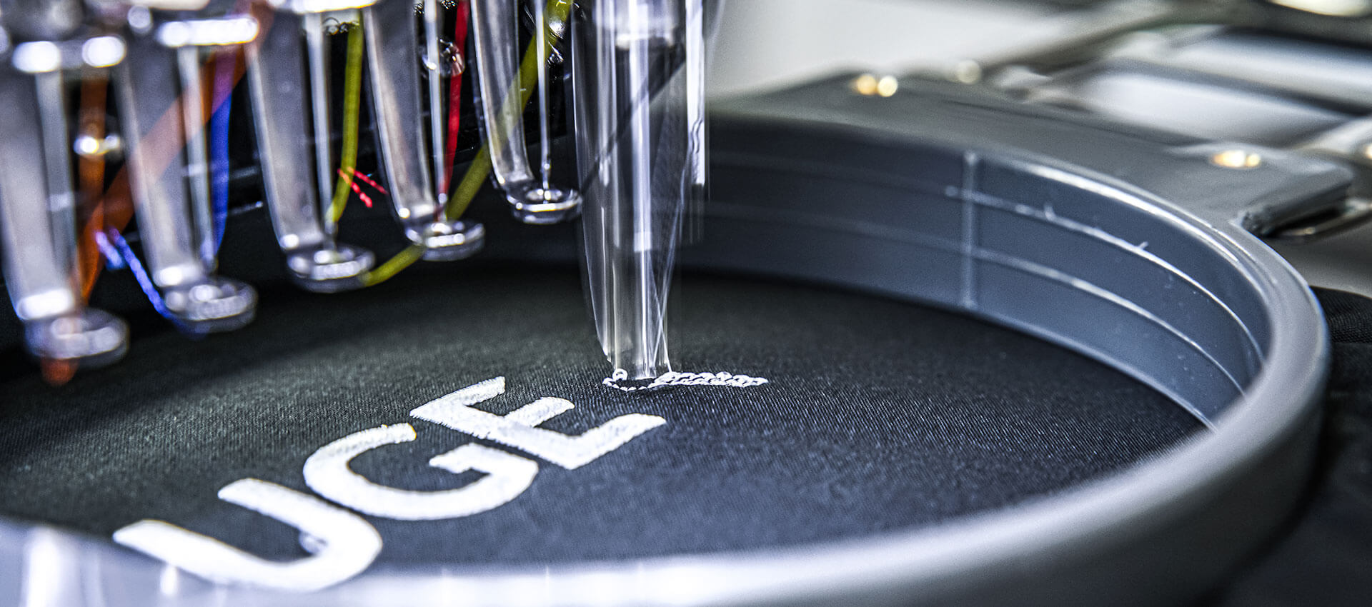 logo being embroidered